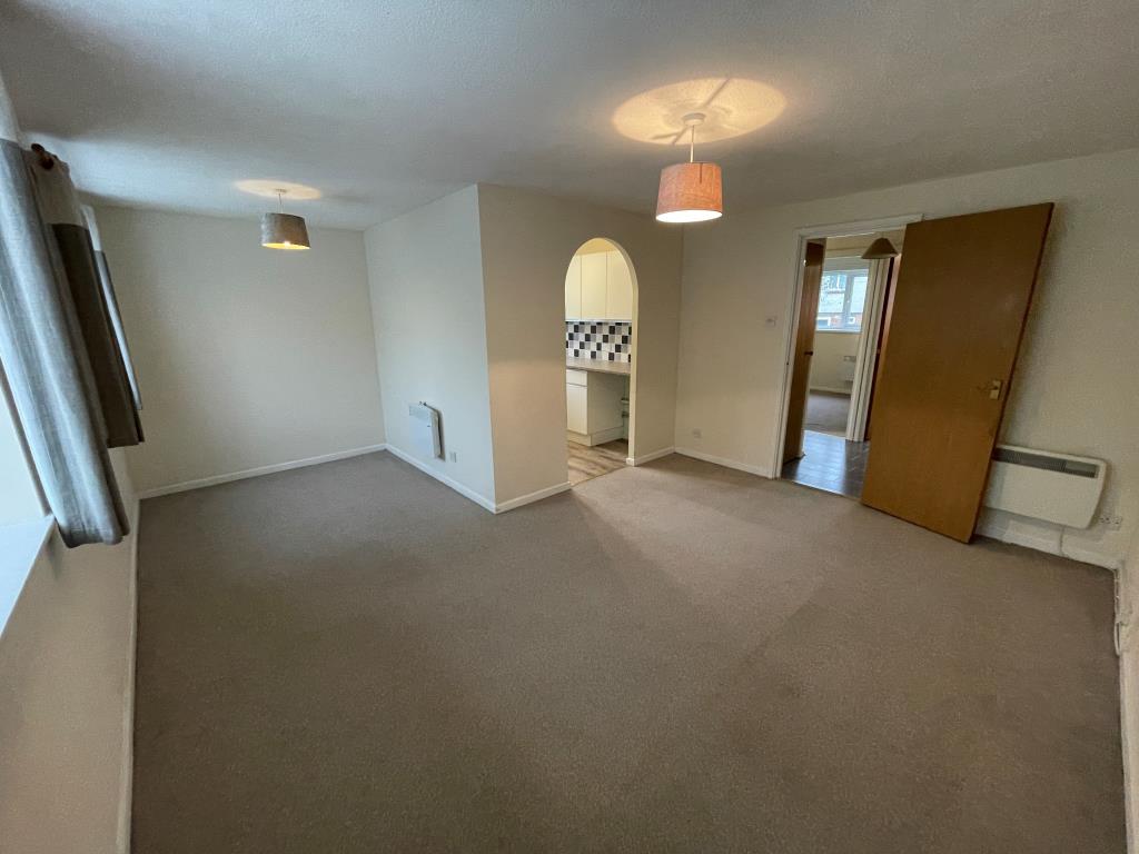 Lot: 75 - VACANT TWO-BEDROOM FLAT - Living room with dining area